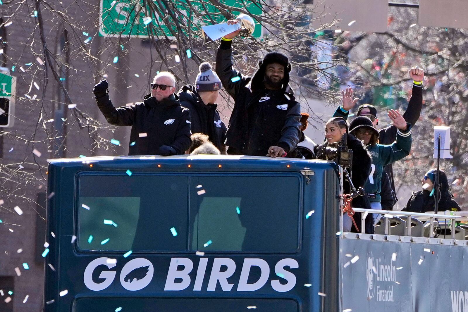 Philadelphia Eagles' Brandon Graham holds up the Lombardi Trophy alongside team owner Jeffrey Lurie, left, during the Philadelphia Eagles' NFL football Super Bowl 59 parade and celebration, Friday, Feb. 14, 2025, in Philadelphia. (AP Photo/Matt Slocum)