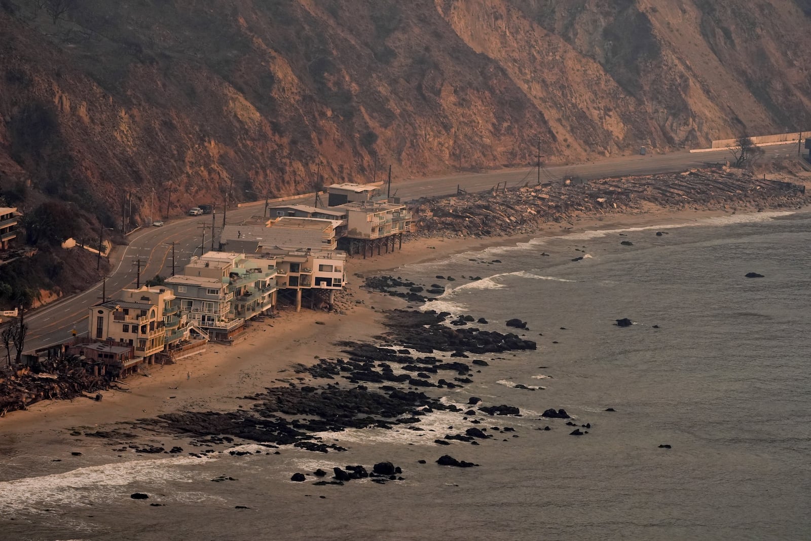 Beach front properties are left destroyed by the Palisades Fire, in this aerial view, Thursday, Jan. 9, 2025 in Malibu, Calif. (AP Photo/Mark J. Terrill)