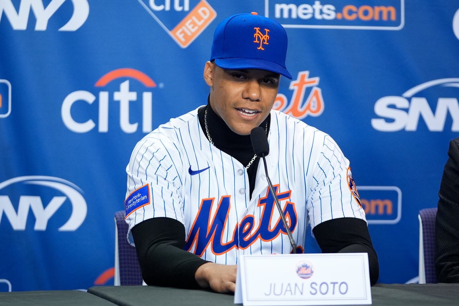 New York Mets' Juan Soto speaks during a news conference, Thursday, Dec. 12, 2024, in New York. (AP Photo/Frank Franklin II)