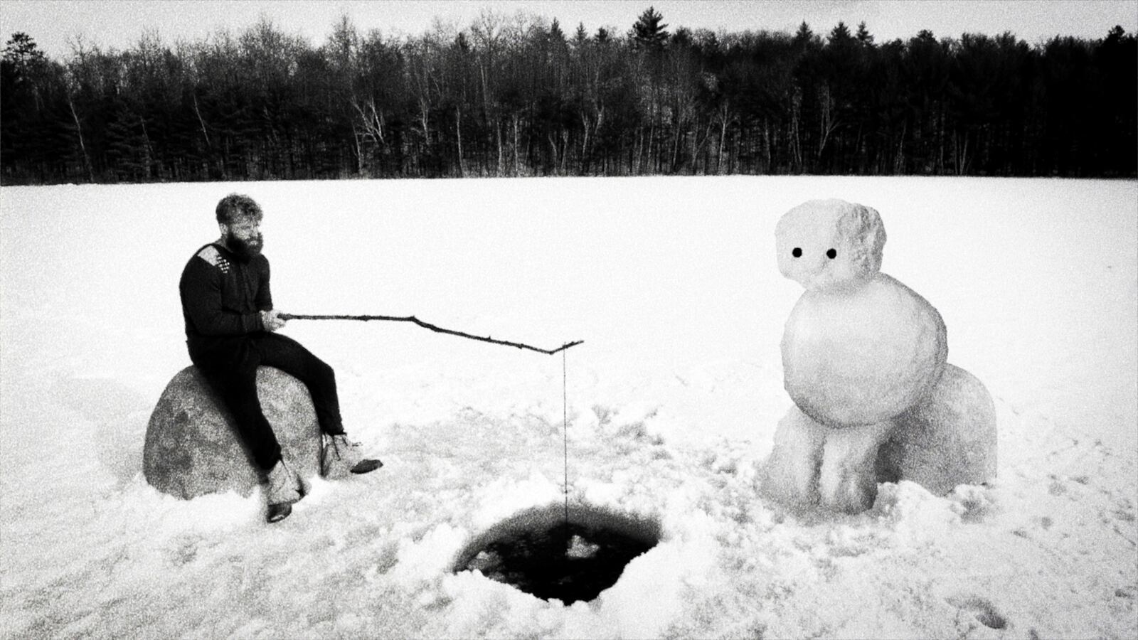 This image released by SRH shows Ryland Brickson Cole Tews in a scene from the film "Hundreds of Beavers." (SRH via AP)