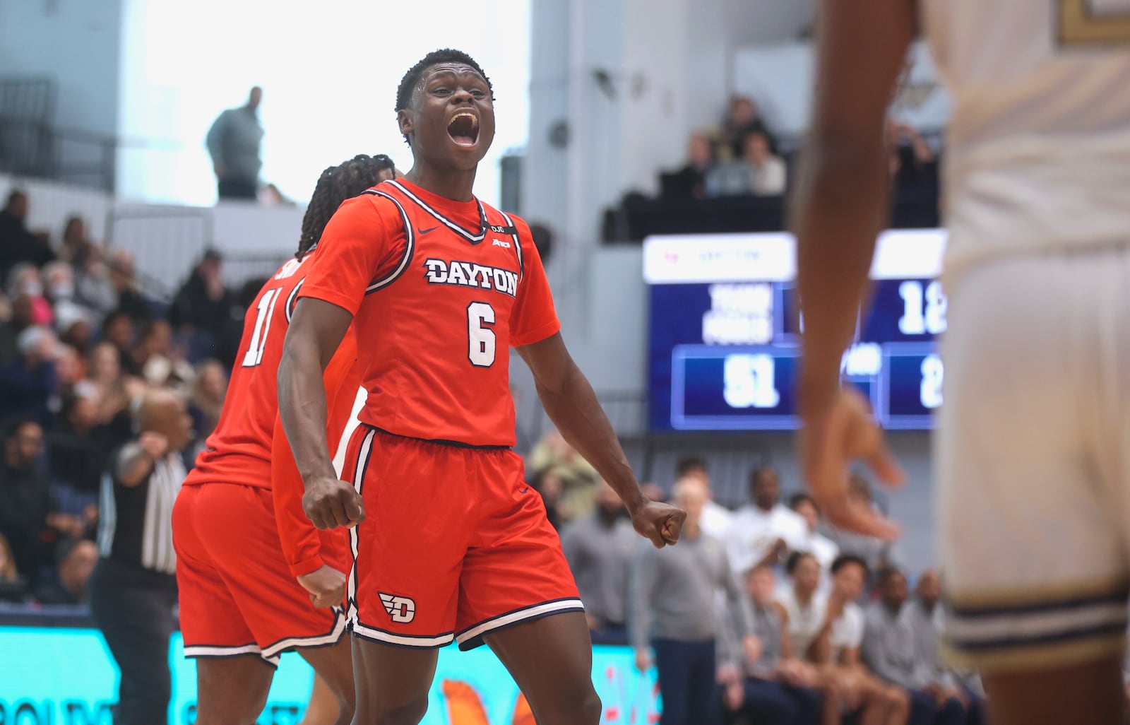 Dayton's Enoch Cheeks reacts after a score against George Washington on Saturday, Jan. 4, 2025, at the Charles E. Smith Center in Washington, D.C. David Jablonski/Staff