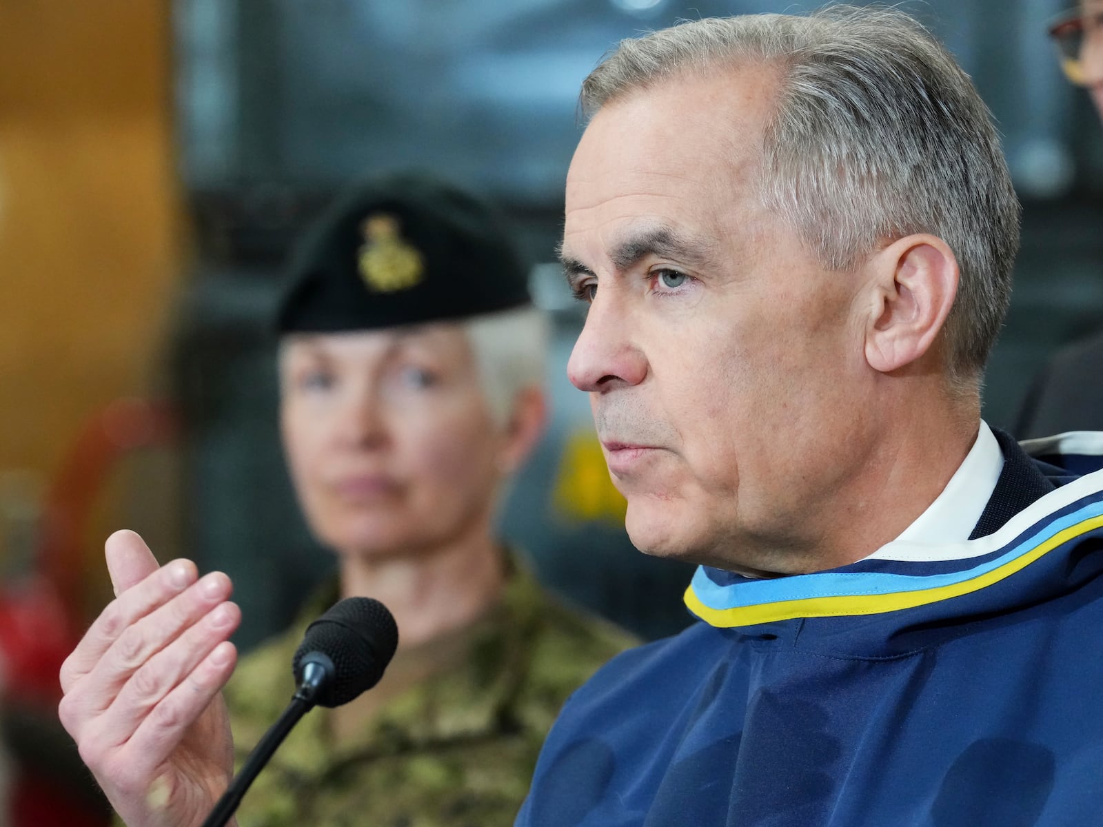 Canada Prime Minister Mark Carney makes an announcement at a Canadian Armed Forces forward-operating location in Iqaluit, Nunavut, on Tuesday, March 18, 2025. (Sean Kilpatrick/The Canadian Press via AP)