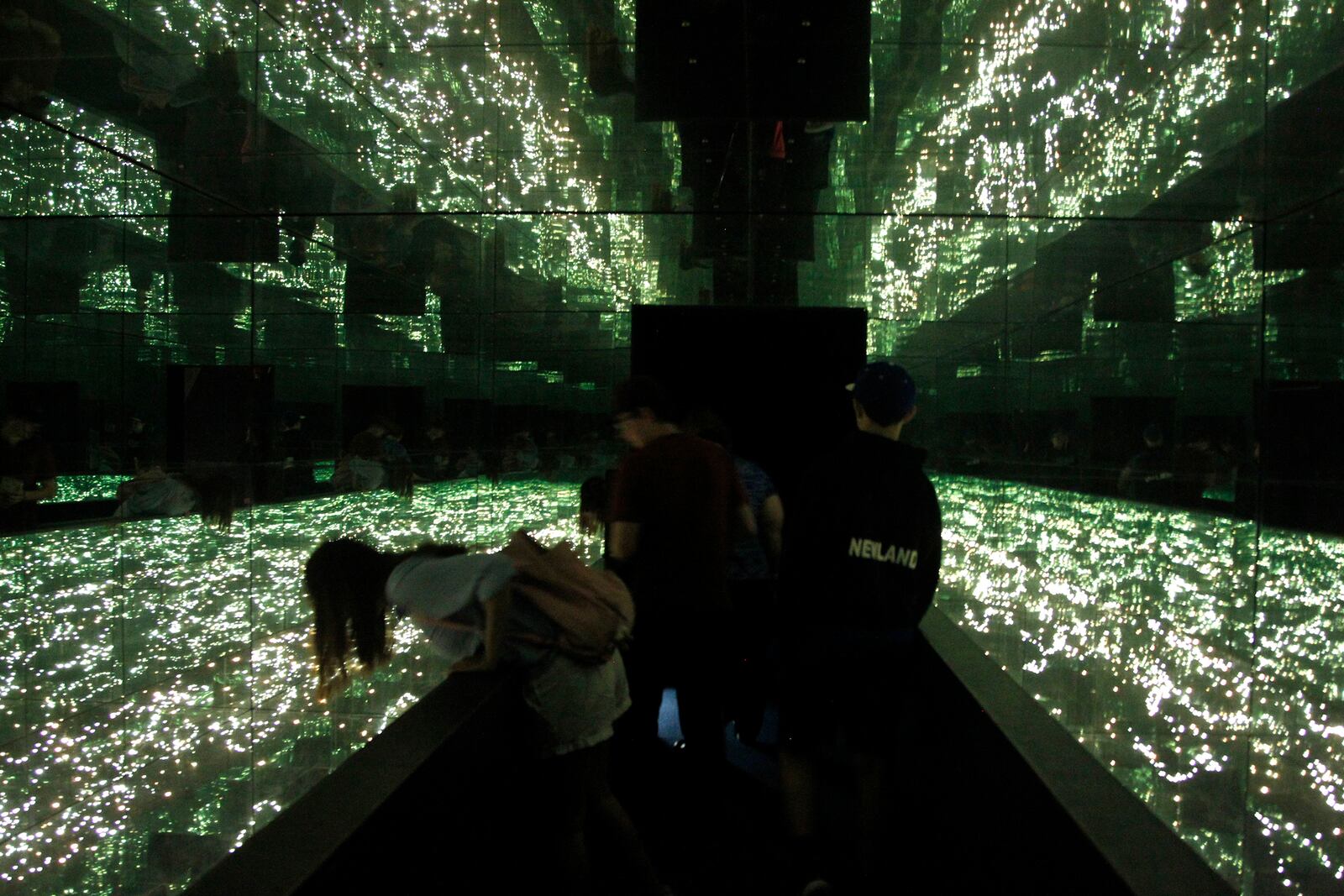 The Infinity Room at the Armstrong Air & Space Museum gives visitors an idea of what it might look like to roam through space. LISA POWELL / STAFF