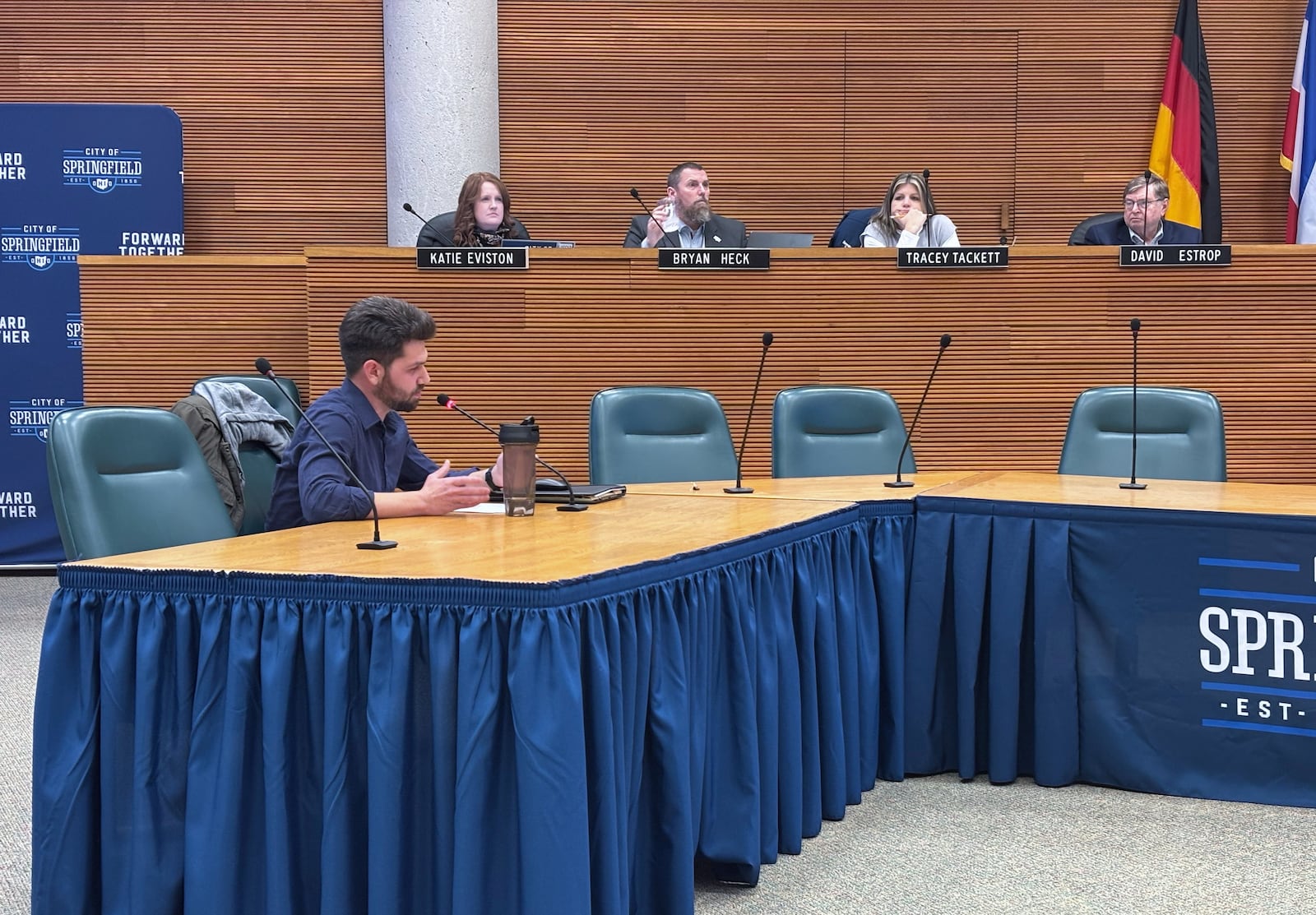 Caleb Perkins, OIC gun violence prevention coordinator presents his findings to the Springfield city commission Tuesday, Feb. 25, 2025. JESSICA OROZCO/STAFF