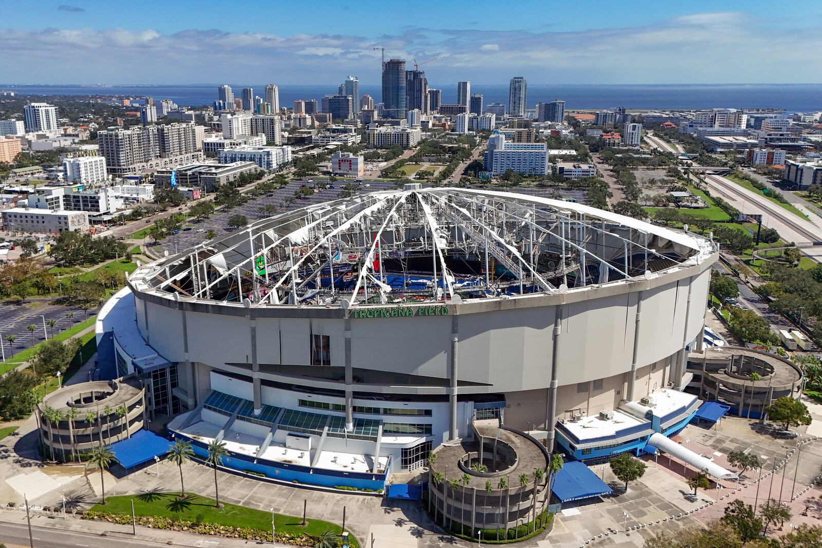 FILE - The roof of the Tropicana Field is damaged the morning after Hurricane Milton hit the region, Oct. 10, 2024, in St. Petersburg, Fla. (AP Photo/Mike Carlson, File)