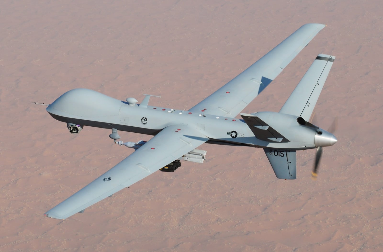 A photo provided by the U.S. Air Force shows an MQ-9 Reaper drone over southern Afghanistan. A Russian warplane on Tuesday, March 14, 2023, intercepted a U.S. surveillance MQ-9 Reaper drone over the Black Sea, striking the drone’s propeller and forcing it down in international waters, according to U.S. European Command, which called the incident “unsafe and unprofessional.” (U.S. Air Force via The New York Times) — NO SALES; EDITORIAL USE ONLY—