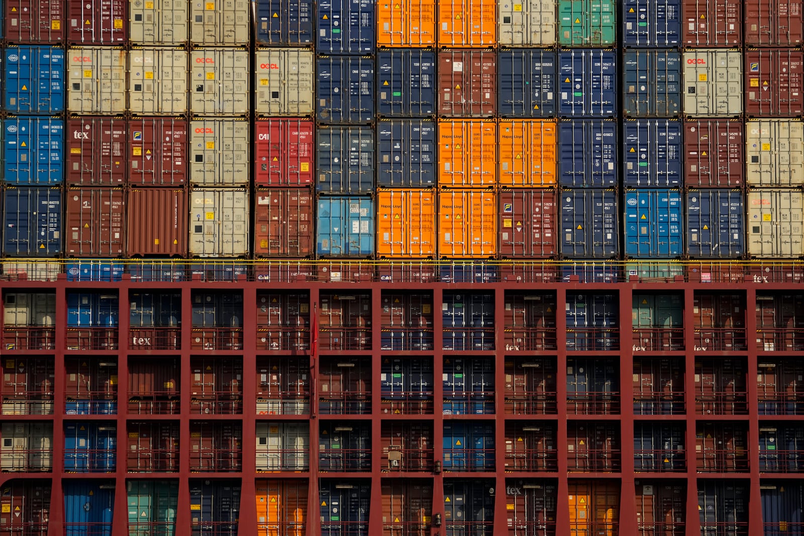 FILE - Containers are stacked on a cargo ship moving through the Panama Canal's Cocoli locks in Panama City, Feb. 21, 2025. (AP Photo/Matias Delacroix, File)