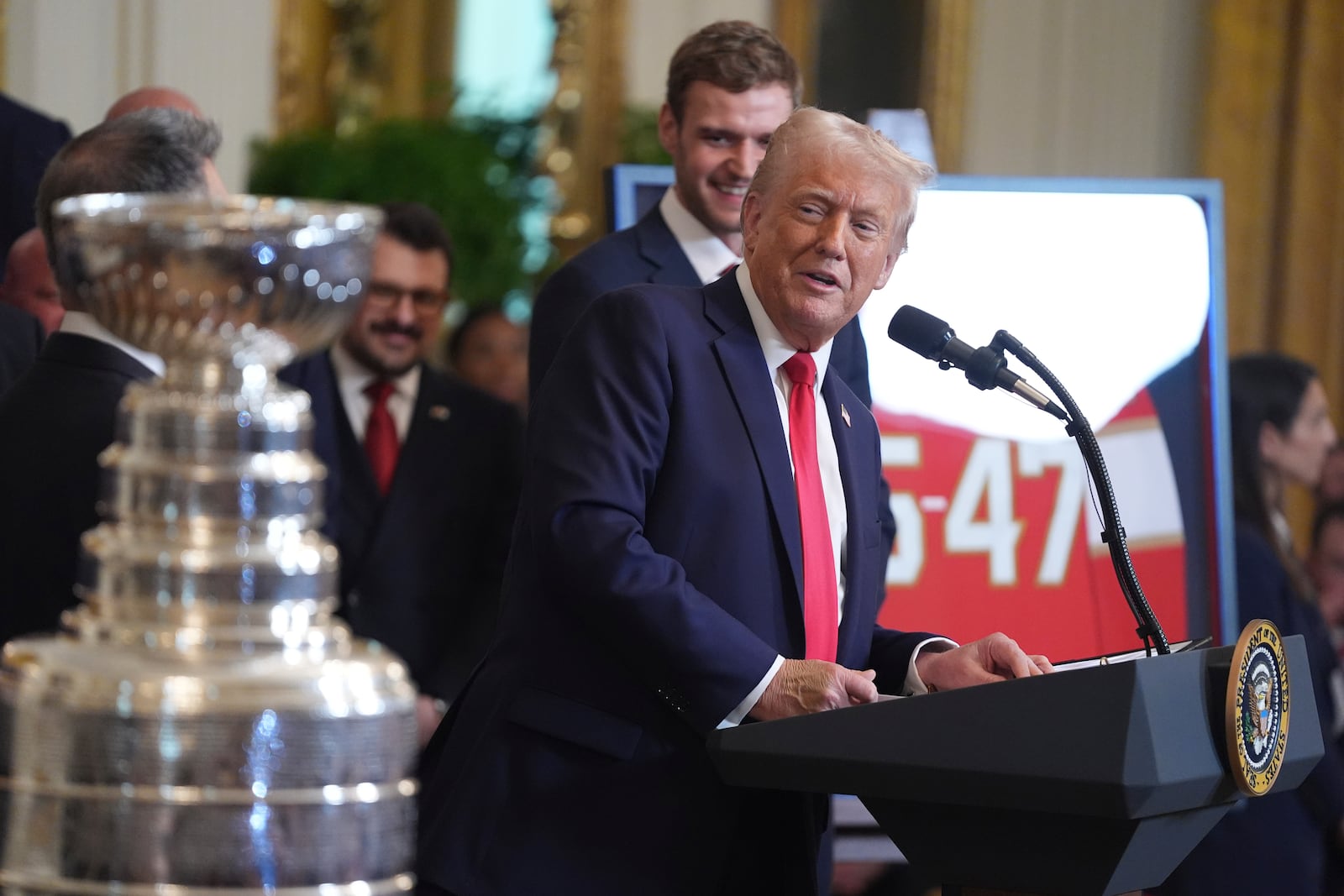 President Donald Trump speaks during an event to honor the 2024 NHL Stanley Cup champion Florida Panthers hockey team in the East Room of the White House, Monday, Feb. 3, 2025, in Washington. (AP Photo/Evan Vucci)