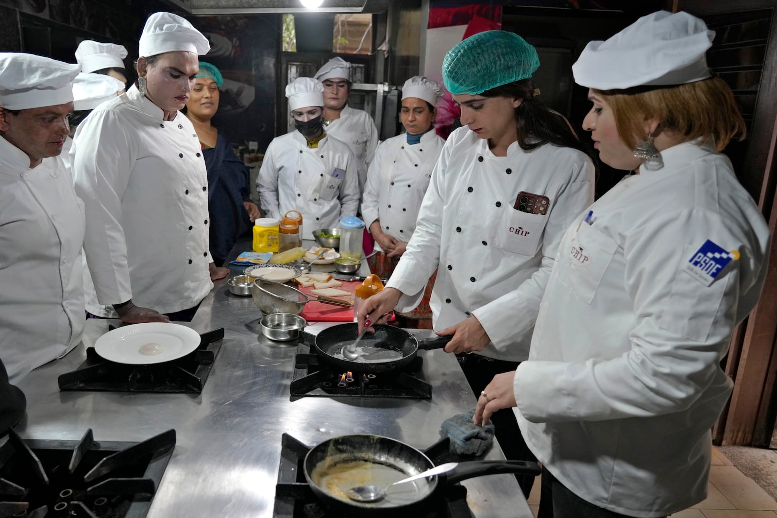 Transgender persons attend cooking class at the Culinary & Hotel Institute of Pakistan, in Lahore, Pakistan, Tuesday, Feb. 25, 2025. (AP Photo/K.M Chaudary)