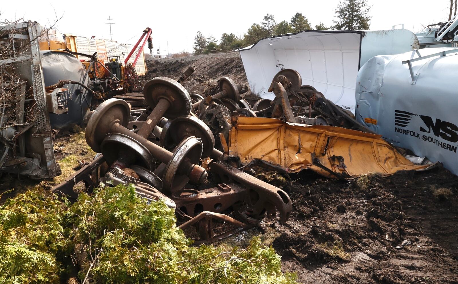 Work continues on the cleanup of the train derailment in Clark County Monday, March 6, 2023. Piles of debris have been stacked as crews worked to get rail service restored. BILL LACKEY/STAFF