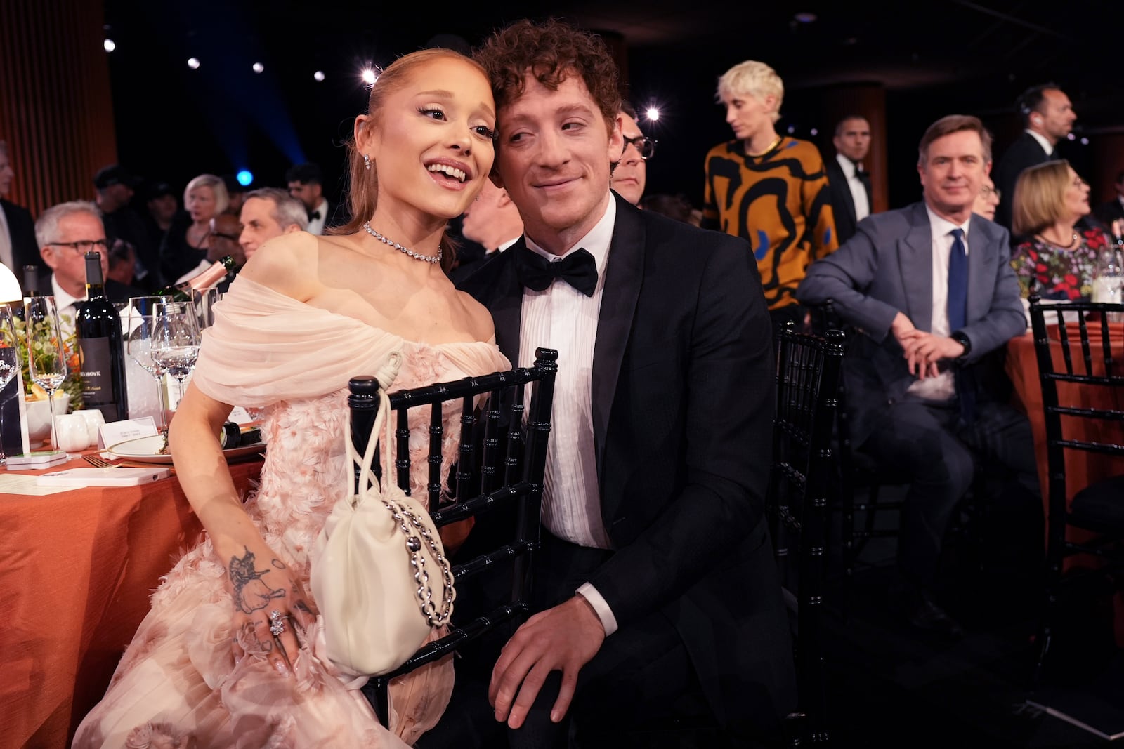 Ariana Grande, left, and Ethan Slater in the audience during the 31st annual Screen Actors Guild Awards on Sunday, Feb. 23, 2025, at the Shrine Auditorium in Los Angeles. (AP Photo/Chris Pizzello)