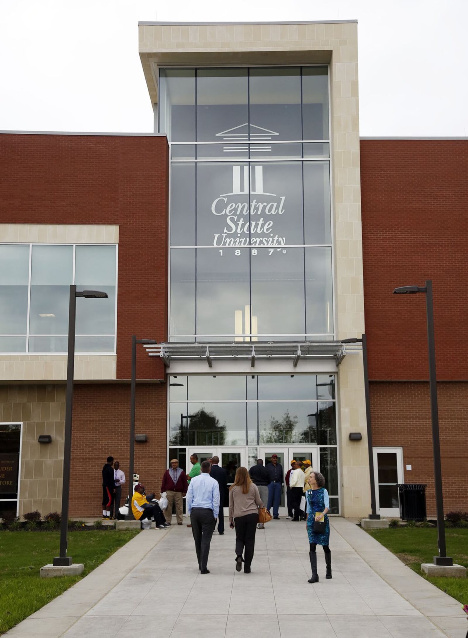 James Shack Harris, left, and Earvin Magic Johnson were in attendance at Central State University on Friday to celebrate the opening of the new $33.5 million CSU Student Center. TY GREENLEES / STAFF