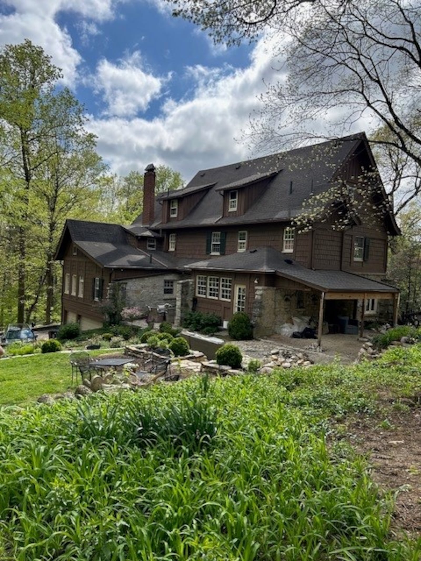 A photo of the backyard at Shadowbrook, Sarena Kelley’s 100-year-old Oakwood home, shows projects complete and in progress. JANA COLLIER/CONTRIBUTED