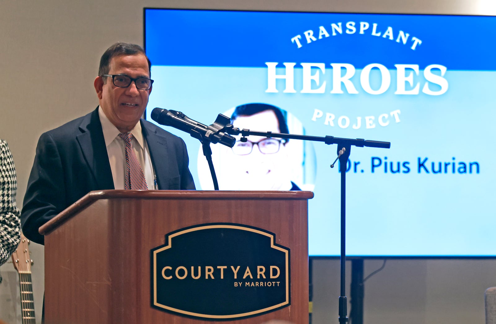 Dr. Pius Kurian speaks during the Mayor's Breakfast after being honored as a Transplant Hero Thursday, Nov. 21, 2024. BILL LACKEY/STAFF