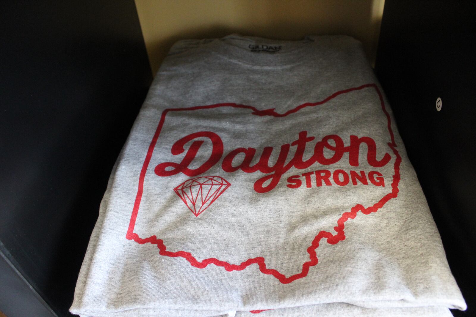 Chief Screen Printing  owners Anthony Tomlinson and James Webster  have raised nearly $5,500 through the sale of Dayton Strong T-shirts.