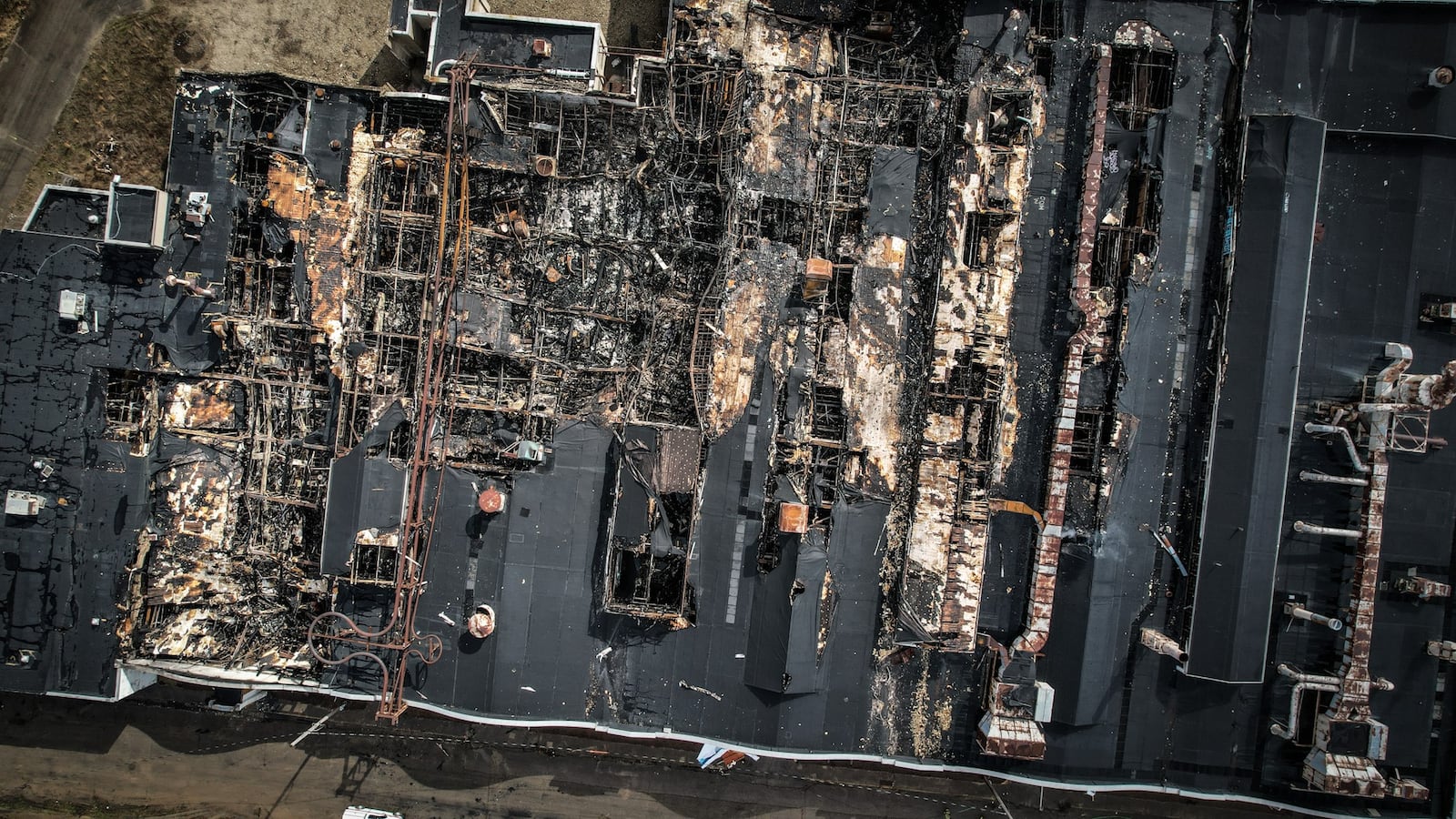 Much of the roof of the Wright Company Factory site has been damaged from fire on March 26, 2023. JIM NOELKER/STAFF