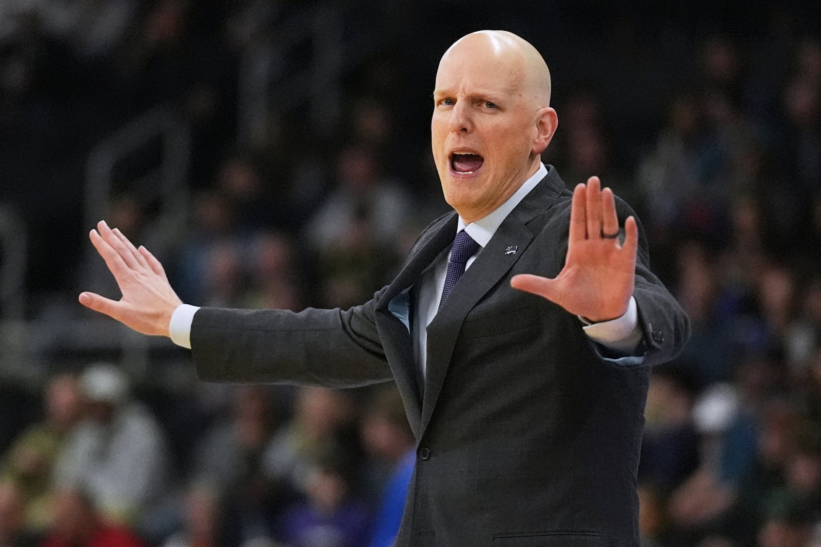 High Point head coach Alan Huss calls to his players during the first half in the first round of the NCAA college basketball tournament, Thursday, March 20, 2025, in Providence, R.I. (AP Photo/Charles Krupa)