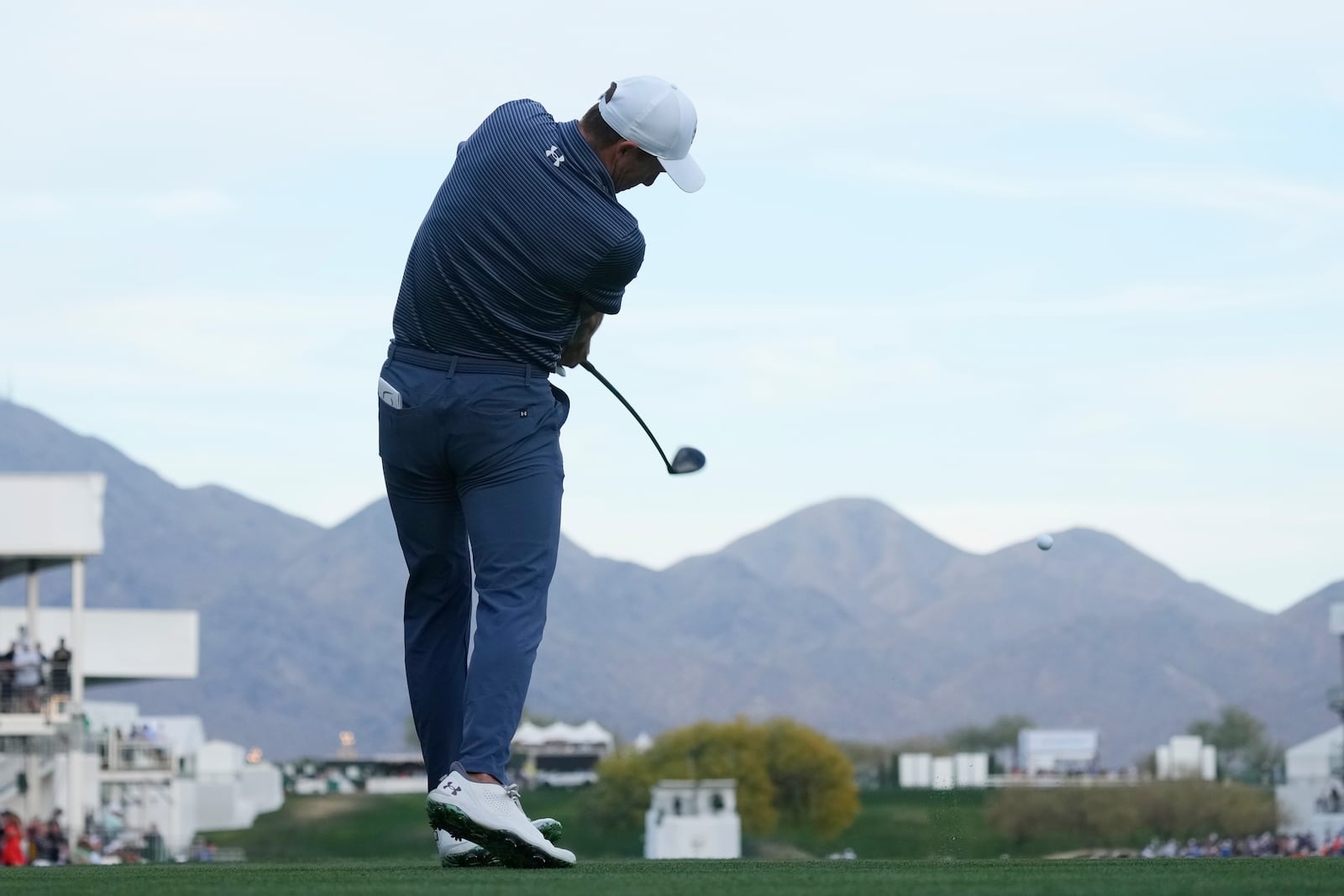 Jordan Spieth hits his tee shot at the 17th hole during the second round of the Phoenix Open golf tournament at the TPC Scottsdale Friday, Feb. 7, 2025, in Scottsdale, Ariz. (AP Photo/Ross D. Franklin)