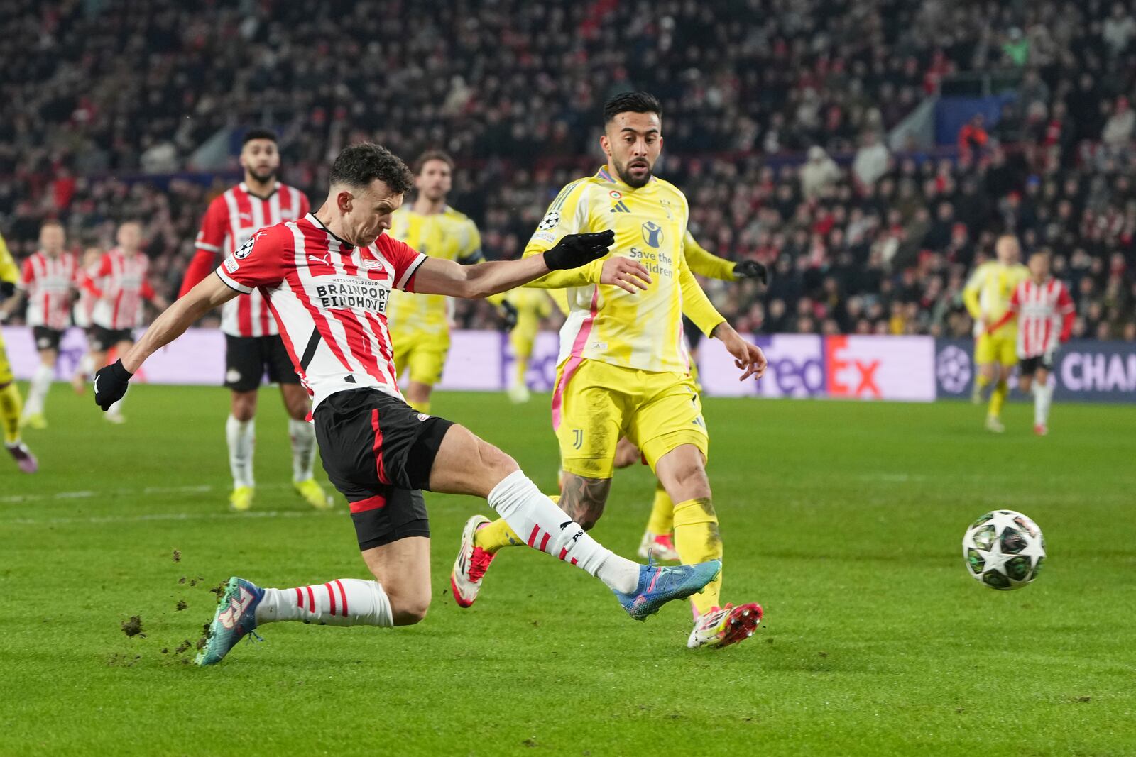 PSV's Ivan Perisic scores his side's opening goal during the Champions League playoff second leg soccer match between PSV and Juventus at Phillips Stadium in Eindhoven, Netherlands, Wednesday, Feb.19, 2025. (AP Photo/Peter Dejong)