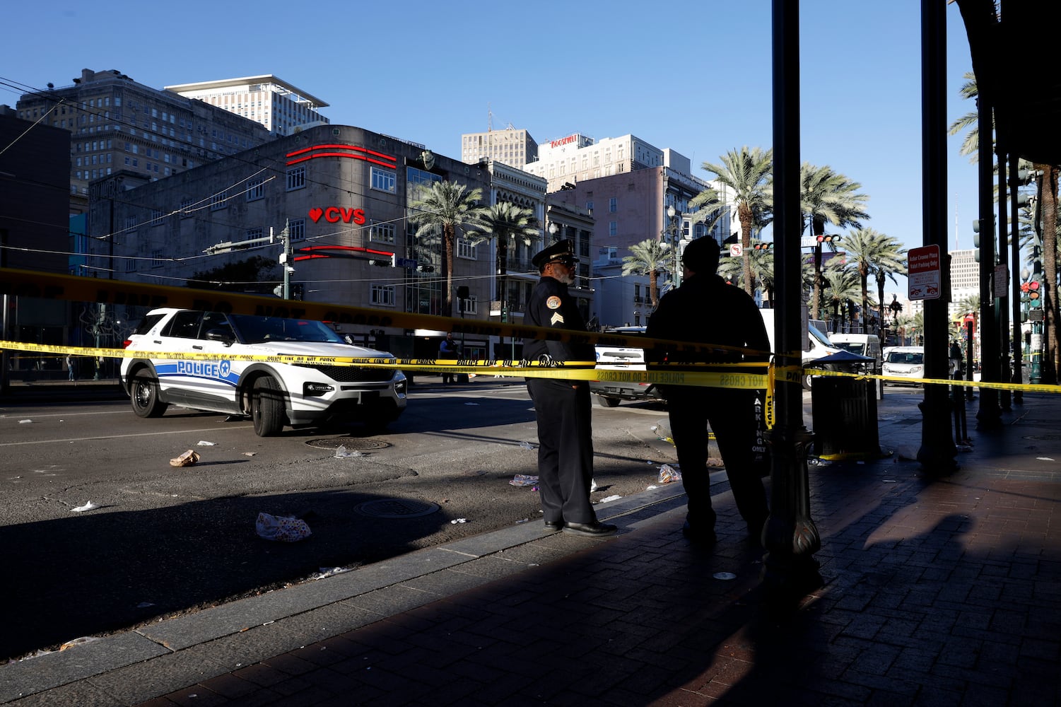 Police officers at the scene, hours after a man drove a pickup truck into people in the French Quarter of New Orleans, on Wednesday, Jan. 1, 2025. (Edmund D. Fountain/The New York Times)