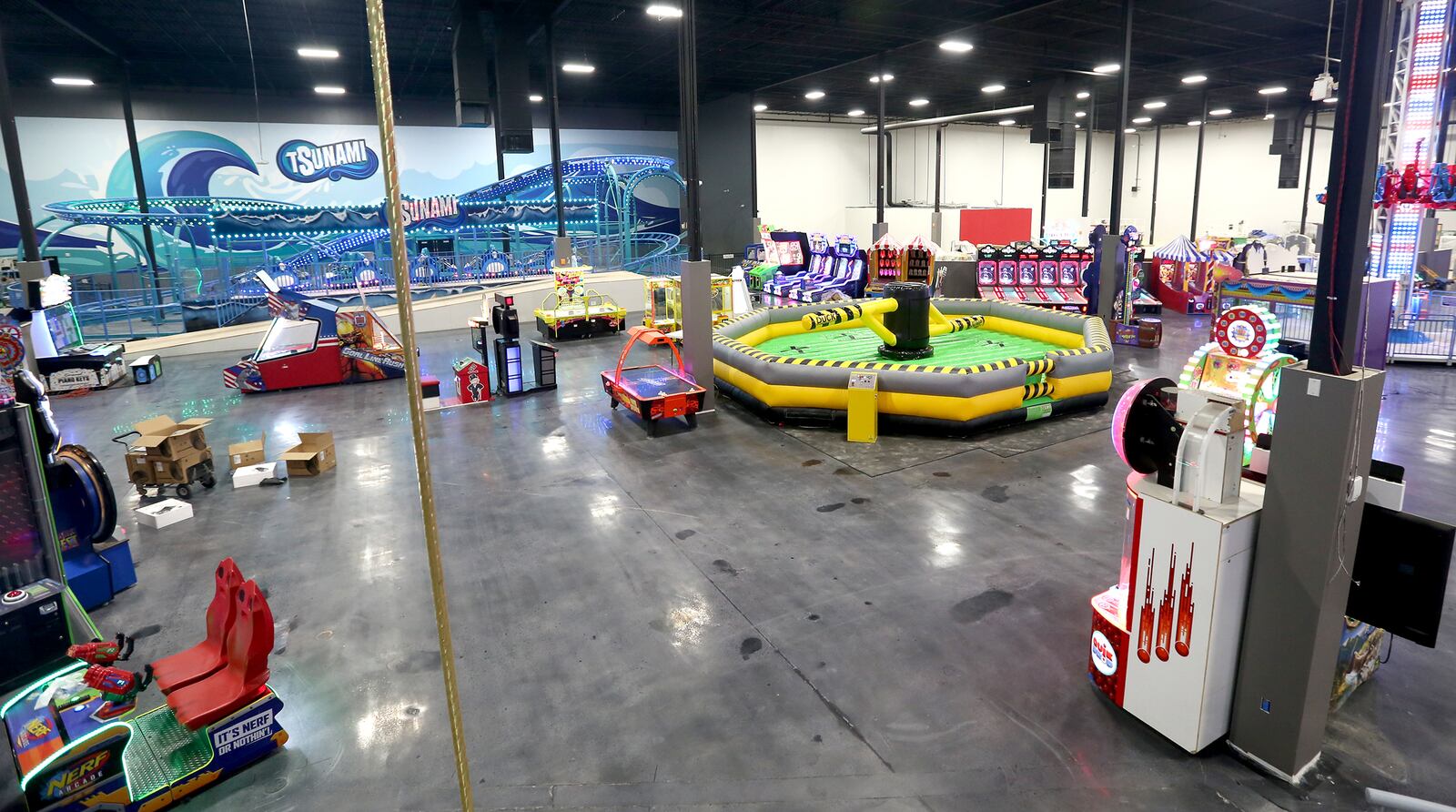 Scene75, closed since May 2019, plans to reopen later this month. The indoor entertainment center on Poe Avenue in Vandalia was heavily damaged by the Memorial Day tornadoes. The newly refurbished center has added a two-story carousel, a spin roller coaster, an indoor 18-hole mini golf course and a banquet center. LISA POWELL / STAFF