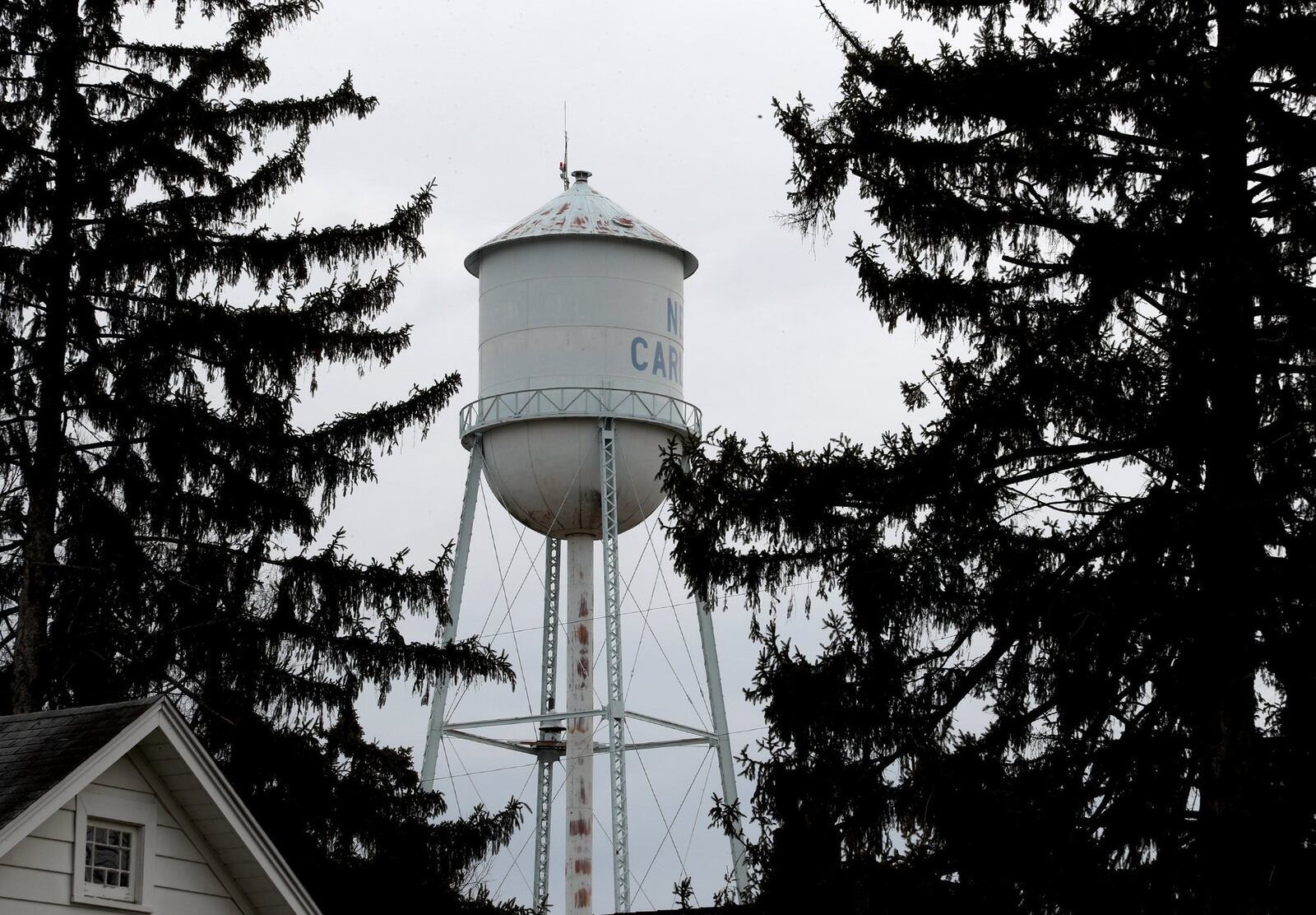 New Carlisle's city council has decided to tear down the Adam’s Water Tower. BILL LACKEY / STAFF