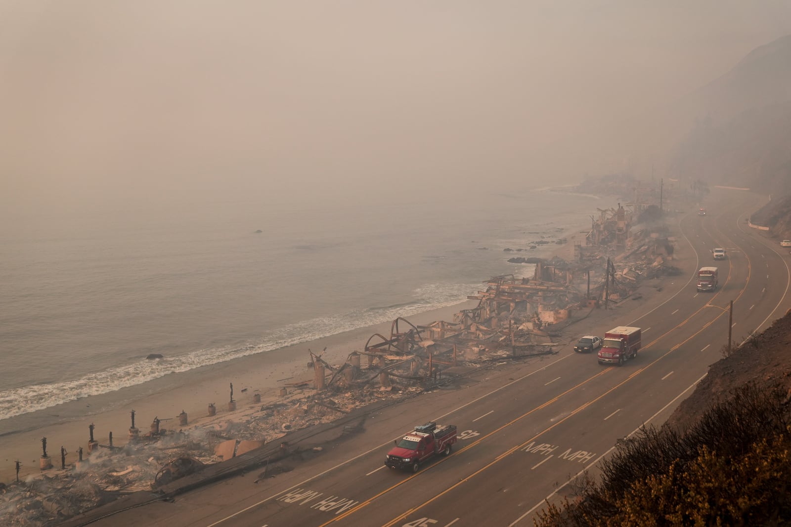 Beach front properties are burned to the ground by the Palisades Fire Thursday, Jan. 9, 2025 in Malibu, Calif. (AP Photo/Jae C. Hong)