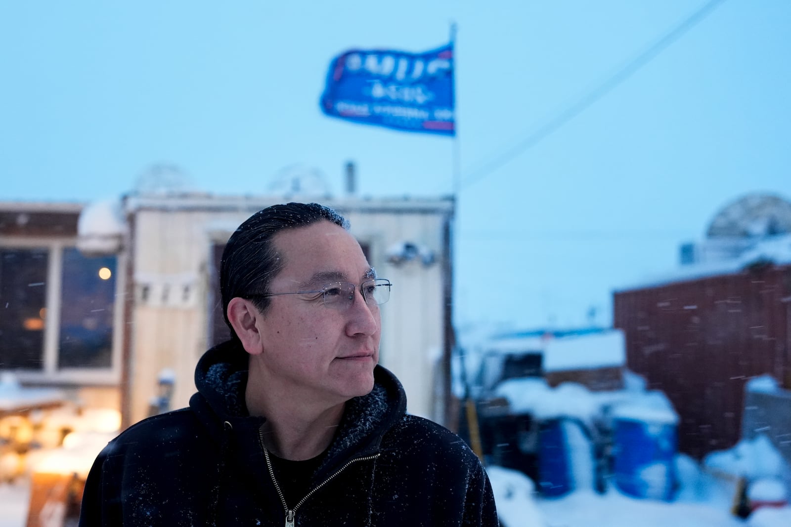 Charles Lampe, president of the Kaktovik Inupiat Corporation and a city council member, poses for a portrait outside his home in Kaktovik, Alaska, Wednesday, Oct. 16, 2024. (AP Photo/Lindsey Wasson)