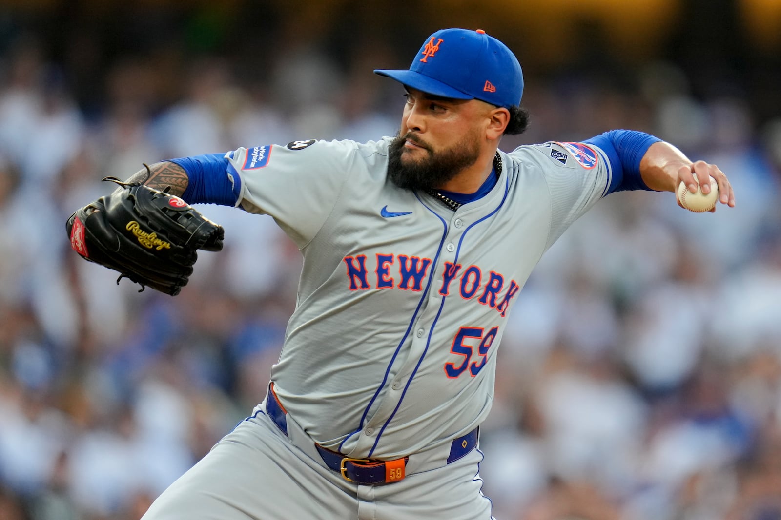 New York Mets pitcher Sean Manaea throws against the Los Angeles Dodgers during the first inning in Game 6 of a baseball NL Championship Series, Sunday, Oct. 20, 2024, in Los Angeles. (AP Photo/Julio Cortez)