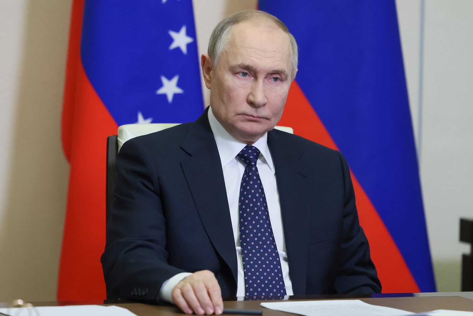 Russian President Vladimir Putin listens to Venezuela's President Nicolás Maduro during their talks via videoconference at the Novo-Ogaryovo state residence outside Moscow, Russia, Friday, March 14, 2025. (Mikhail Metzel, Sputnik, Kremlin Pool Photo via AP)