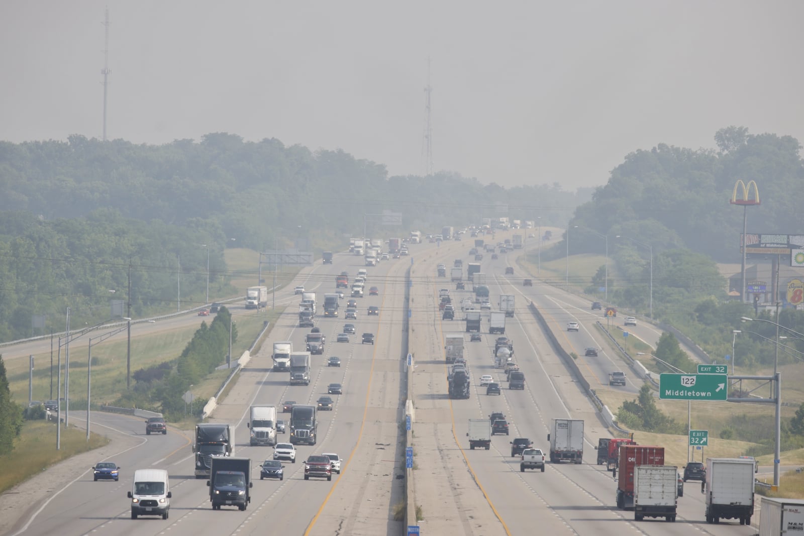 A haze can be seen looking north on I-75 near Middletown Tuesday, June 6, 2023. Smoke from wildfires in Canada has prompted an air quality alert for several southwest Ohio counties. NICK GRAHAM/STAFF