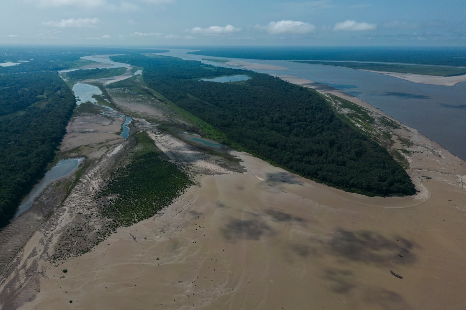 Signs of drought are visible on the Amazon River, near Leticia, Colombia, Sunday, Oct. 20, 2024. (AP Photo/Ivan Valencia)