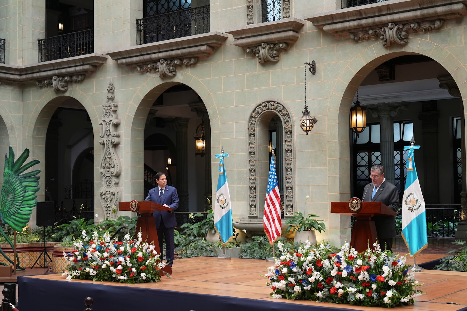 U.S. Secretary of State Marco Rubio, left, listens during a joint news conference with Guatemalan President Bernardo Arevalo at the National Palace in Guatemala City, Wednesday, Feb. 5, 2025. (AP Photo/Moises Castillo)