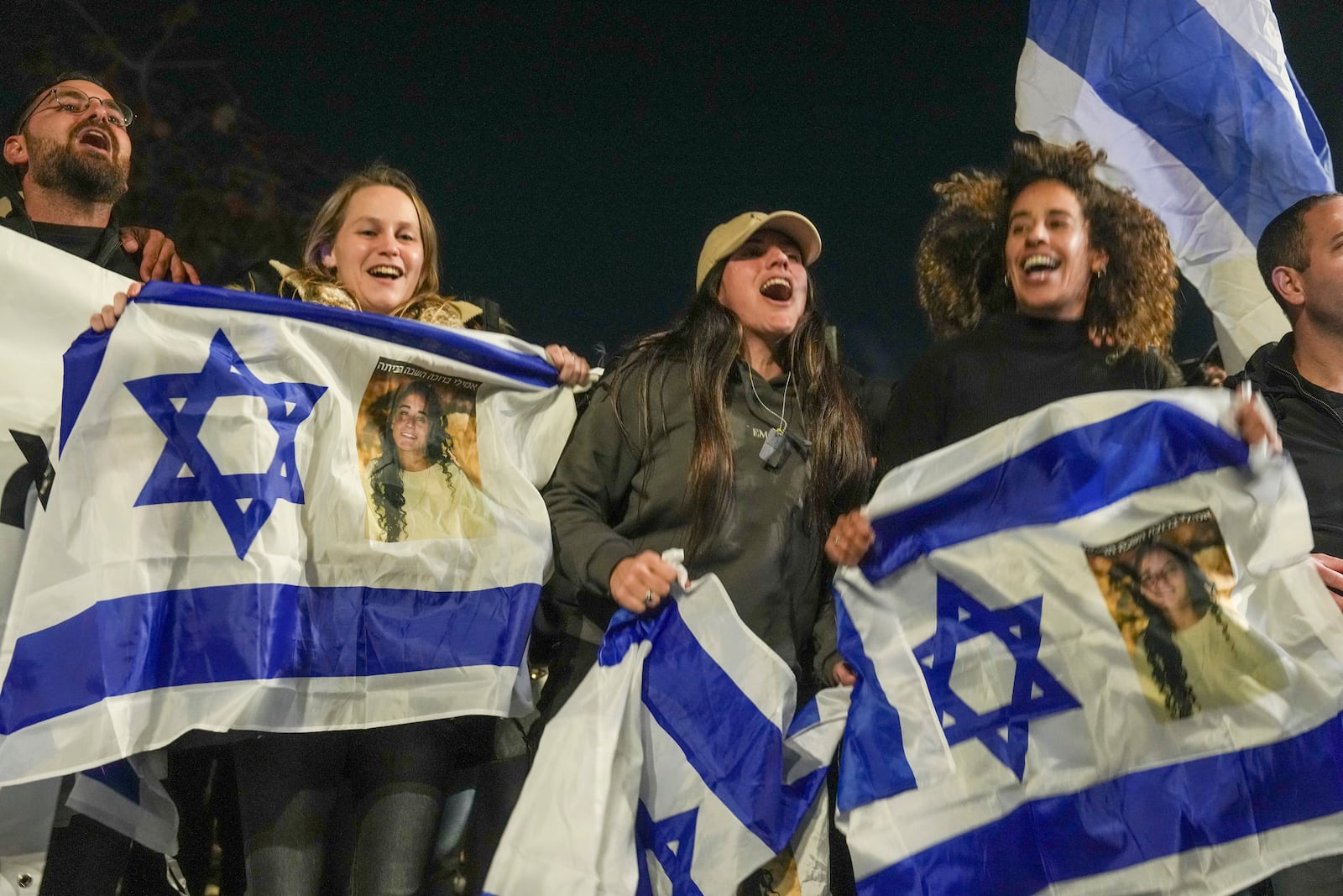 Israelis celebrate the release of three hostages who had been held captive by Hamas in Gaza as they gather in Tel Aviv, Israel, Sunday, Jan. 19, 2025. (Photo/Ariel Schalit)