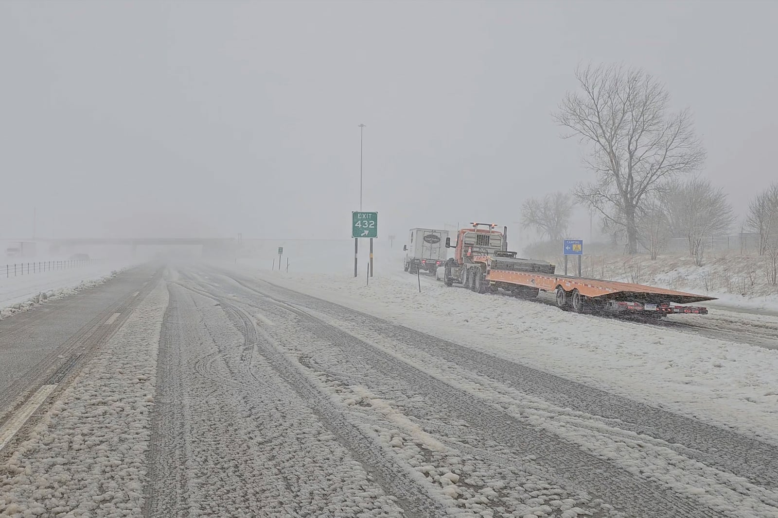 This image provided by Nebraska State Patrol shows vehicles stopped on the highway during blizzard near Gretna, Neb., on Wednesday, March 19, 2025. (Nebraska State Patrol via AP)