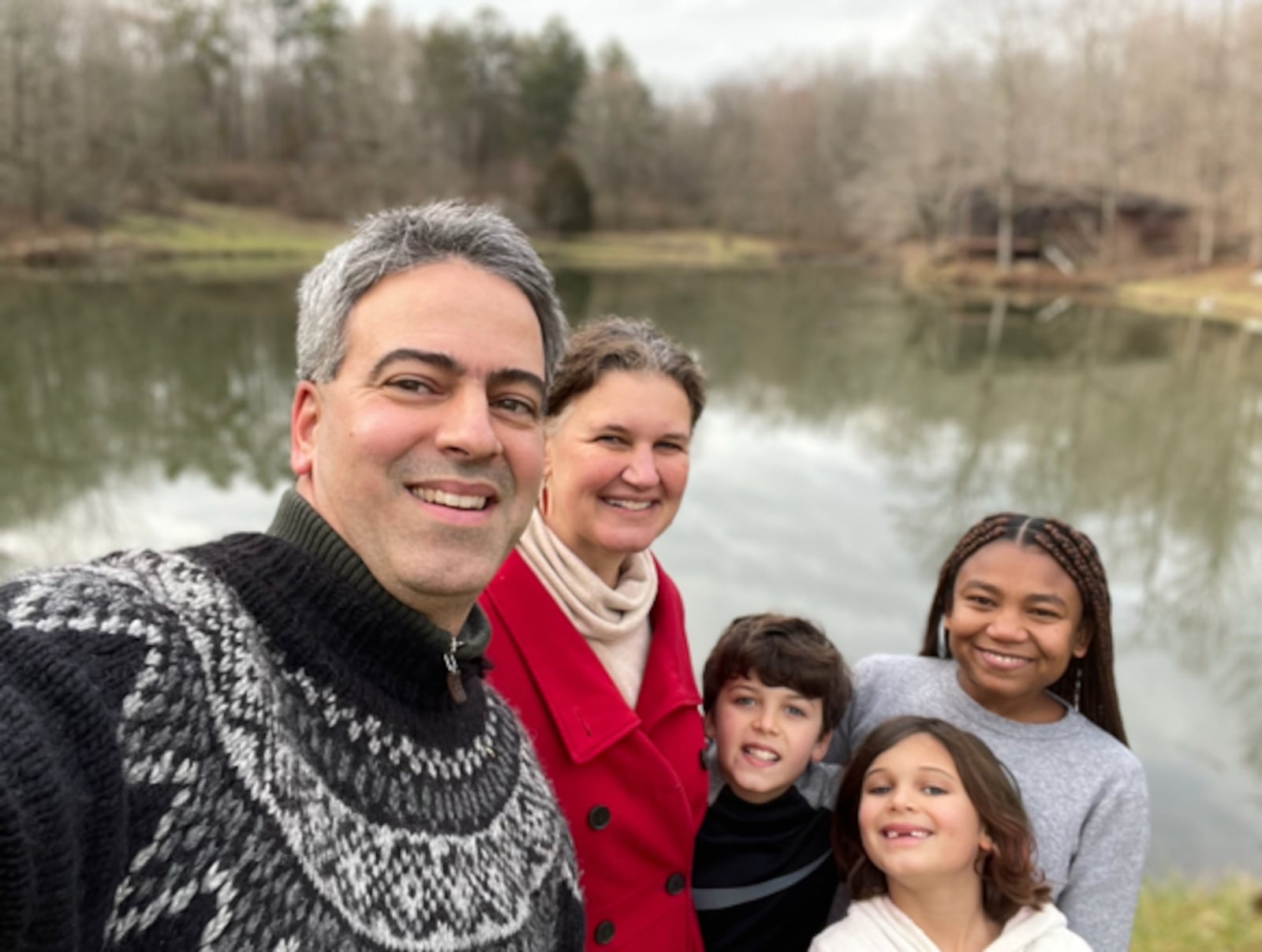 Potter Naysan Mcllhargey of Miami Valley Pottery with his family.