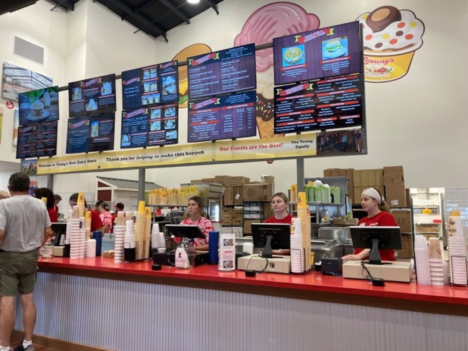 A steady stream of early customers began at 10 a.m. on Aug. 26 inside the new Young's Jersey Dairy facility situated directly behind what has been the dairy barn just outside of Yellow Springs since 1968.