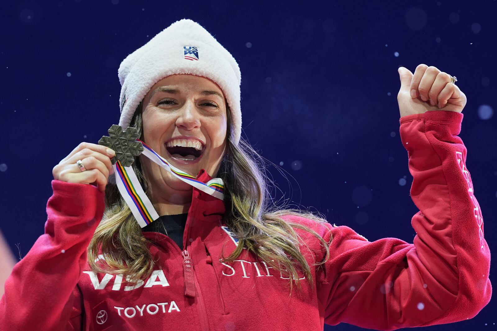 United States' Paula Moltzan shows her bronze medal for a women's giant slalom, at the Alpine Ski World Championships, in Saalbach-Hinterglemm, Austria, Thursday, Feb. 13, 2025. (AP Photo/Giovanni Auletta)