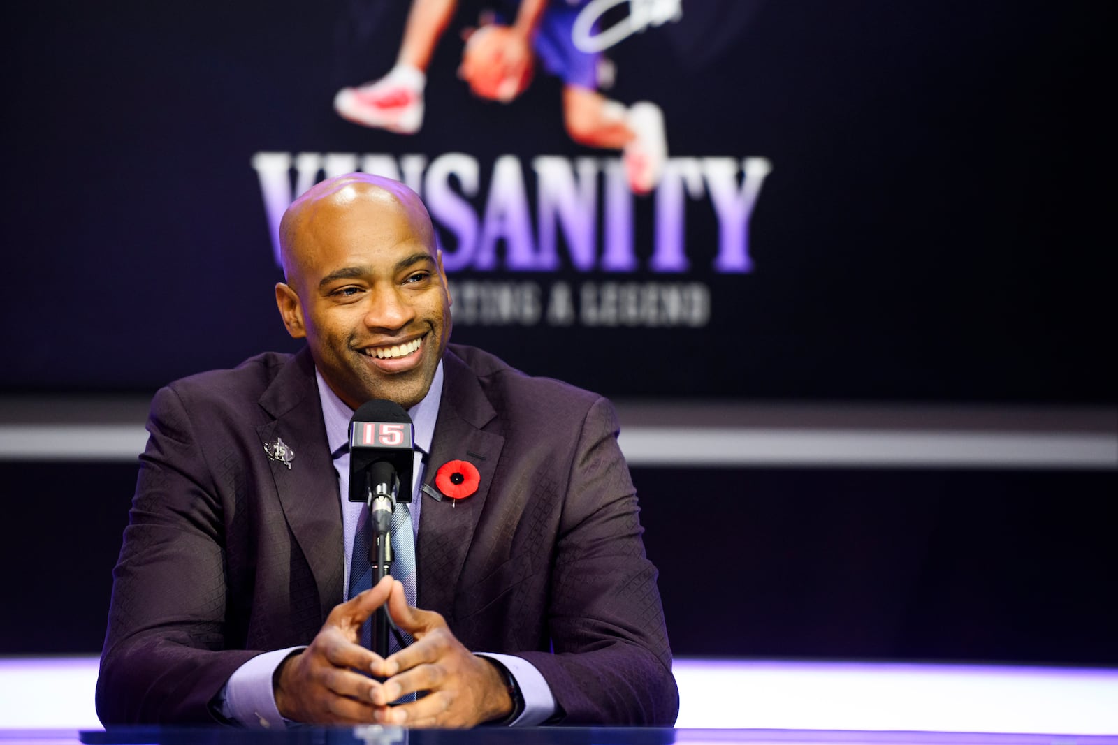 Former Toronto Raptors player Vince Carter speaks to media ahead of his number retirement, before an NBA basketball game between the Toronto Raptors and the Sacramento Kings at the Scotiabank arena in Toronto on Saturday, Nov. 2, 2024. (Christopher Katsarov/The Canadian Press via AP)