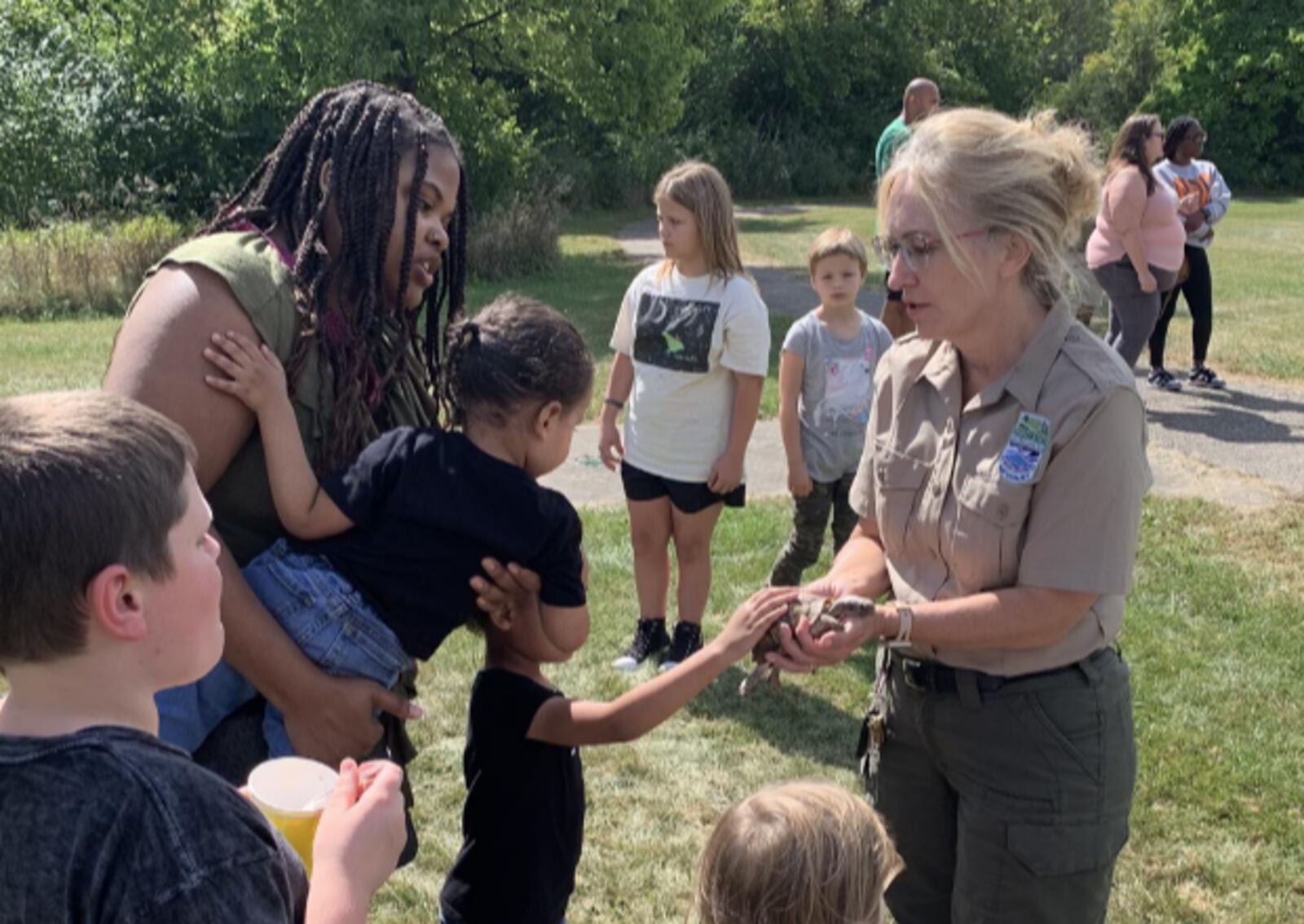 Hueston Woods guests check out animals at the nature center at the state park. CONTRIBUTED