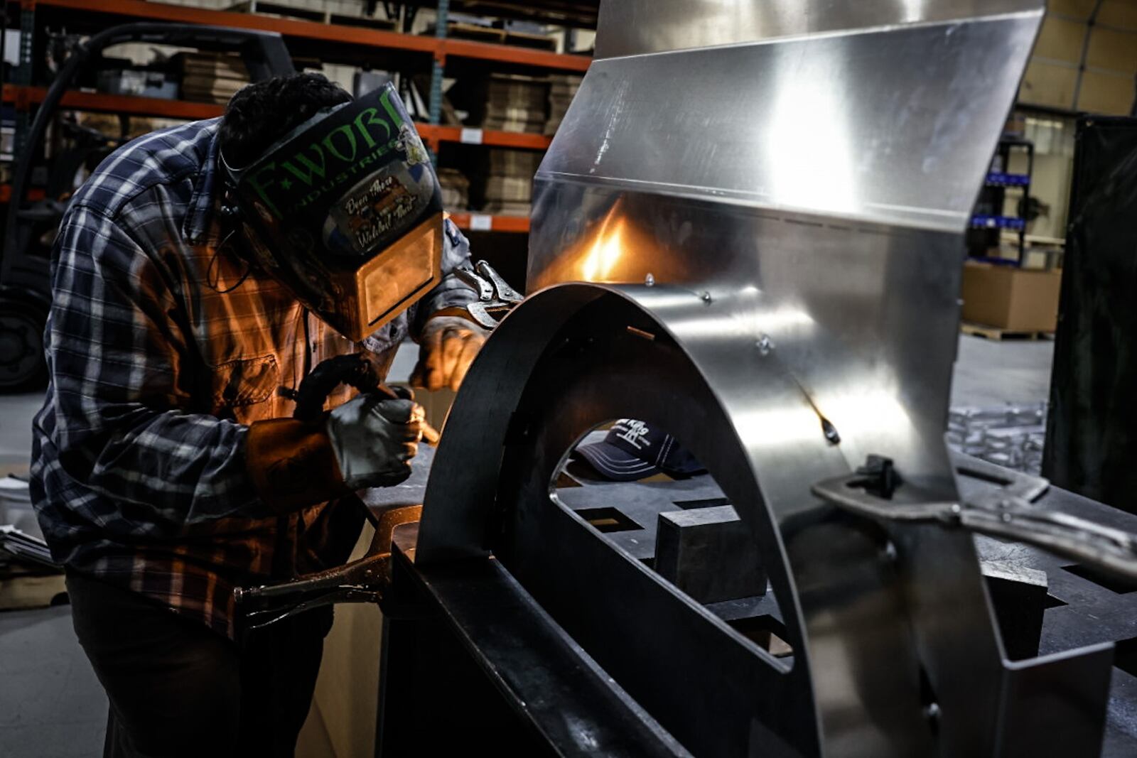 Staub Manufacturing Solutions welder Chris Hanselman works on a part for heavy equipment Wednesday January 10, 2024. JIM NOELKER/STAFF