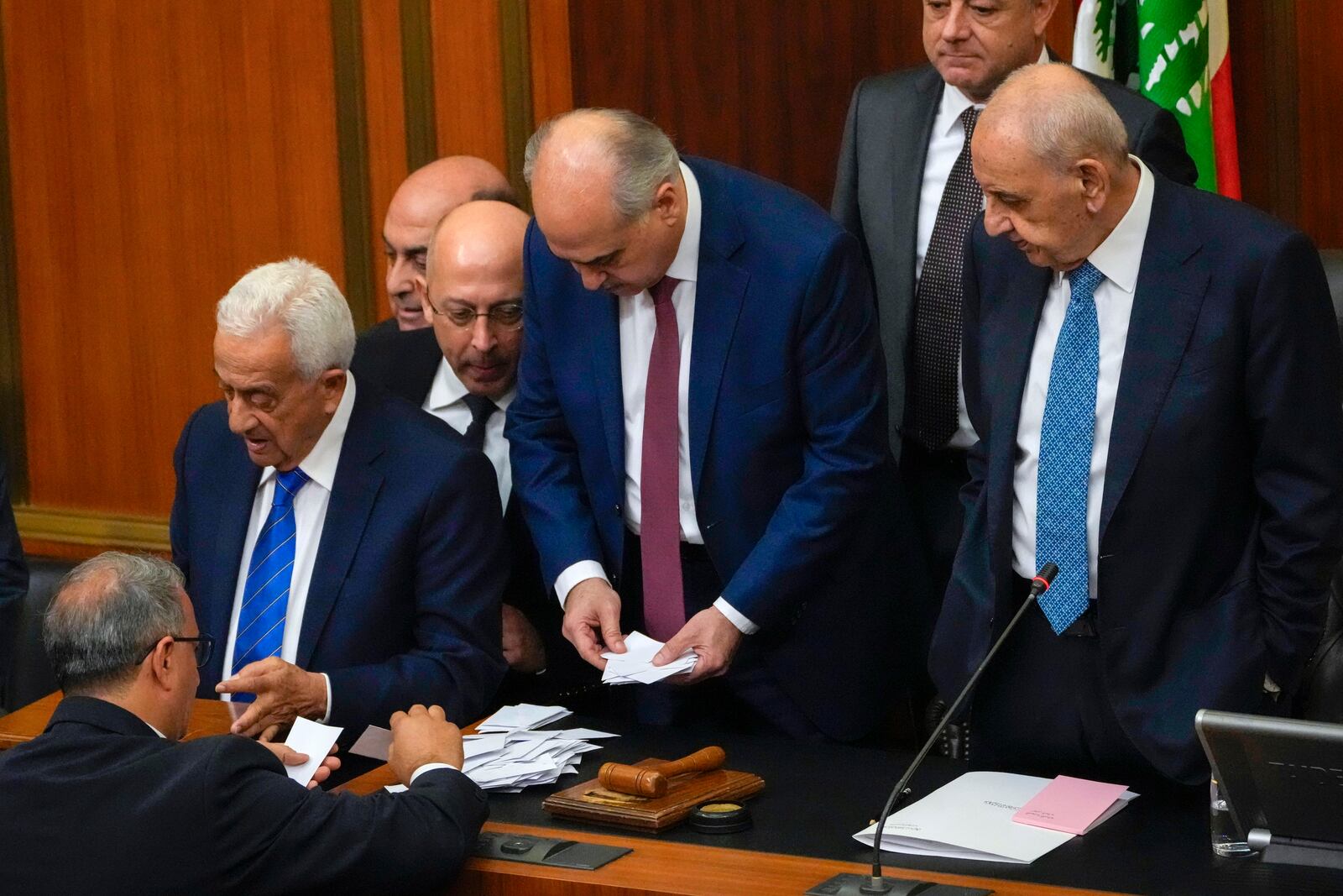 Lebanese lawmakers count the votes after casting their ballots to elect a new president, at the parliament building in downtown Beirut, Lebanon, Thursday, Jan. 9, 2025. (AP Photo/Hussein Malla)