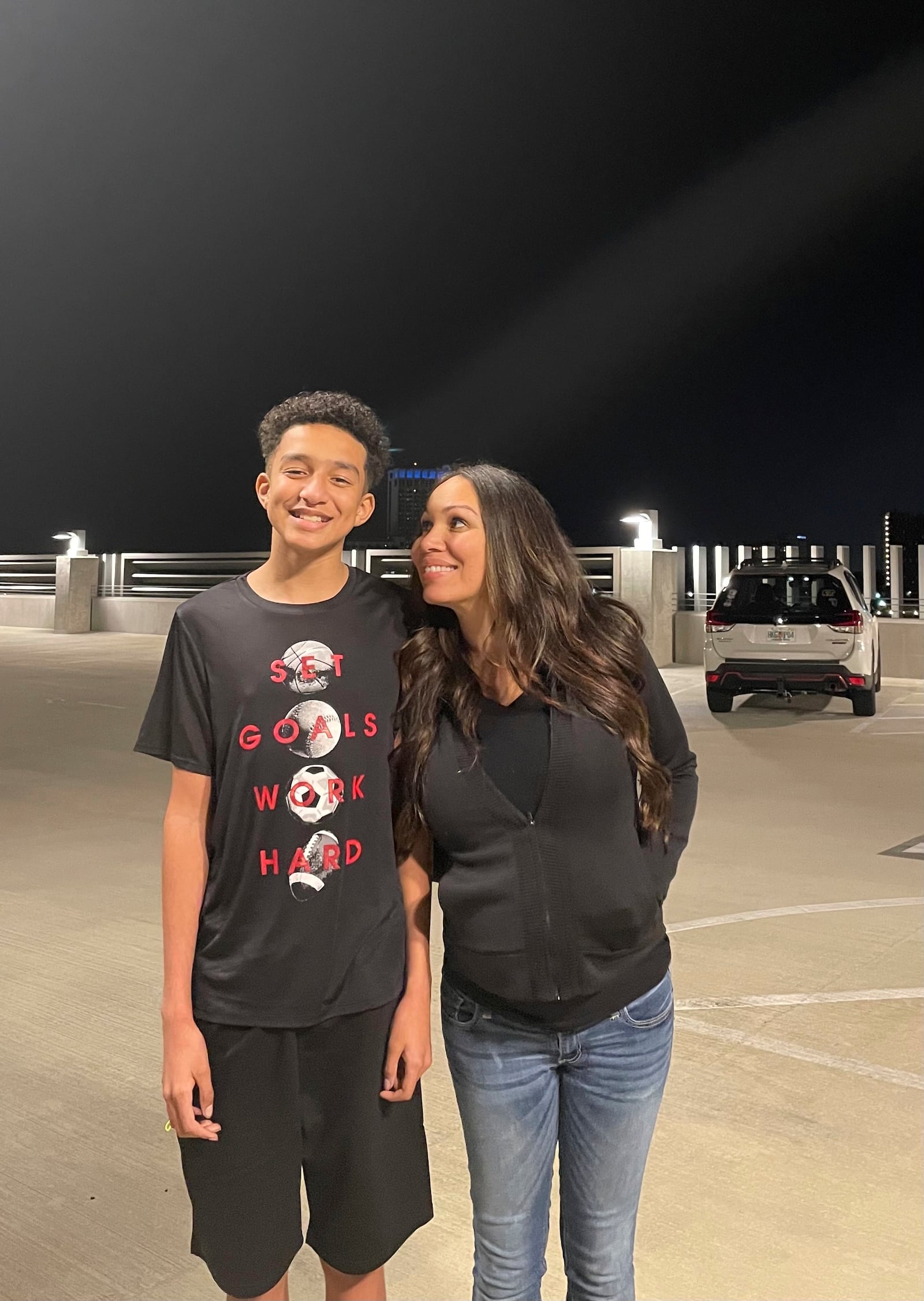 In this undated photo provided by Megan Garcia of Florida in October 2024, she stands with her son, Sewell Setzer III. (Megan Garcia via AP)