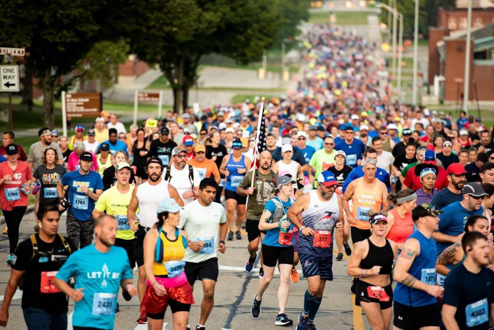 Thousands of runners pour through Area B on Sept. 17 during the 2022 Air Force Marathon at Wright-Patterson Air Force Base. More than 8,000 runners and 1,500 volunteers from all 50 states and around the world participated in the race’s 26th year. U.S. AIR FORCE PHOTO/HANNAH CARRANZA