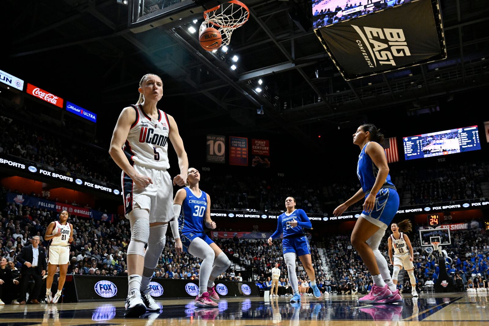 UConn guard Paige Bueckers (5) reacts after making a basket while being fouled during the second half of an NCAA college basketball game against Creighton in the finals of the Big East Conference tournament, Monday, March 10, 2025, in Uncasville, Conn. (AP Photo/Jessica Hill)