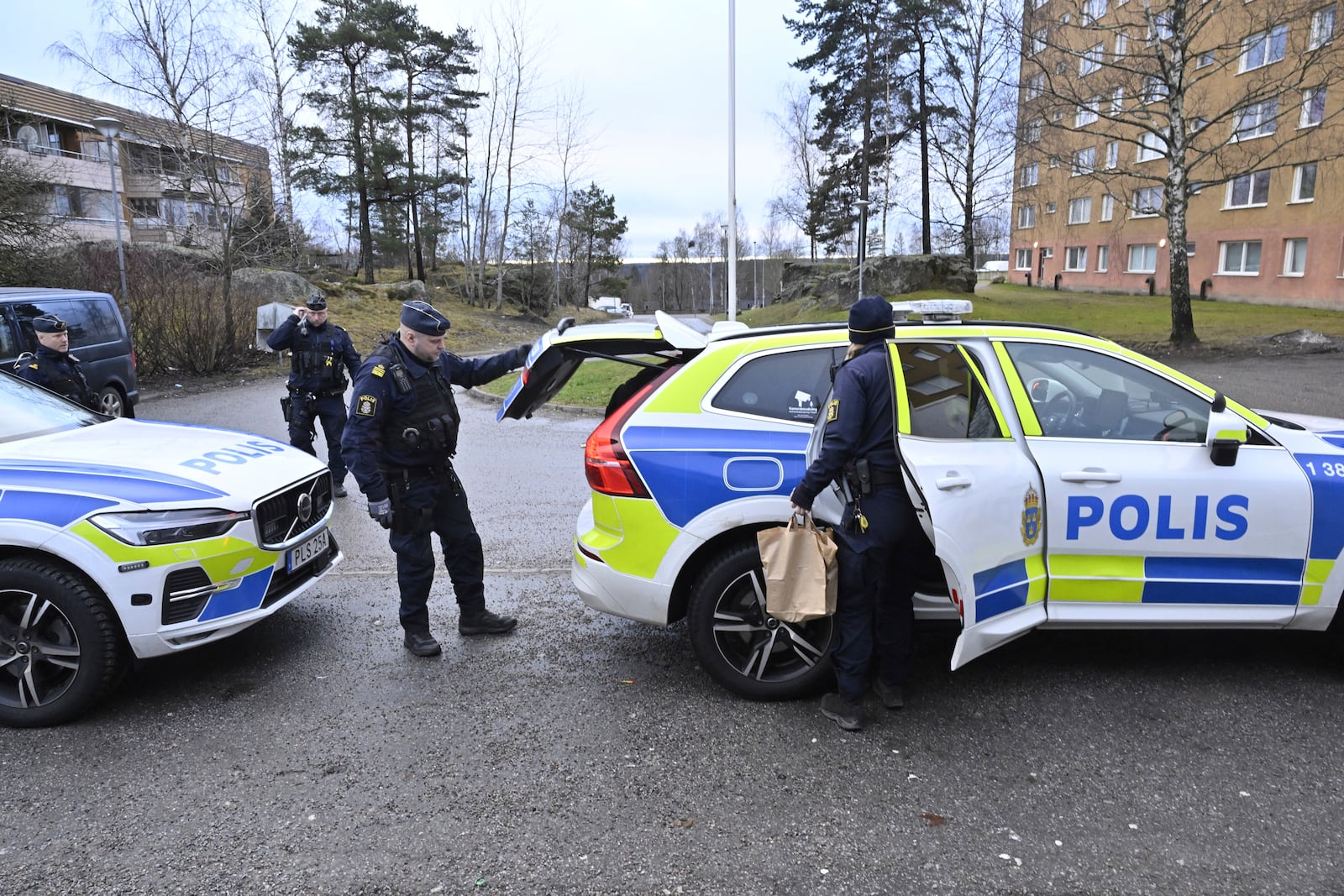 Police operations in Södertälje, south of Stockholm, Thursday Jan. 30, 2025, following the shooting of Salwan Momika in an apartment late last night. (Jonas Ekströmer/TT News Agency via AP)