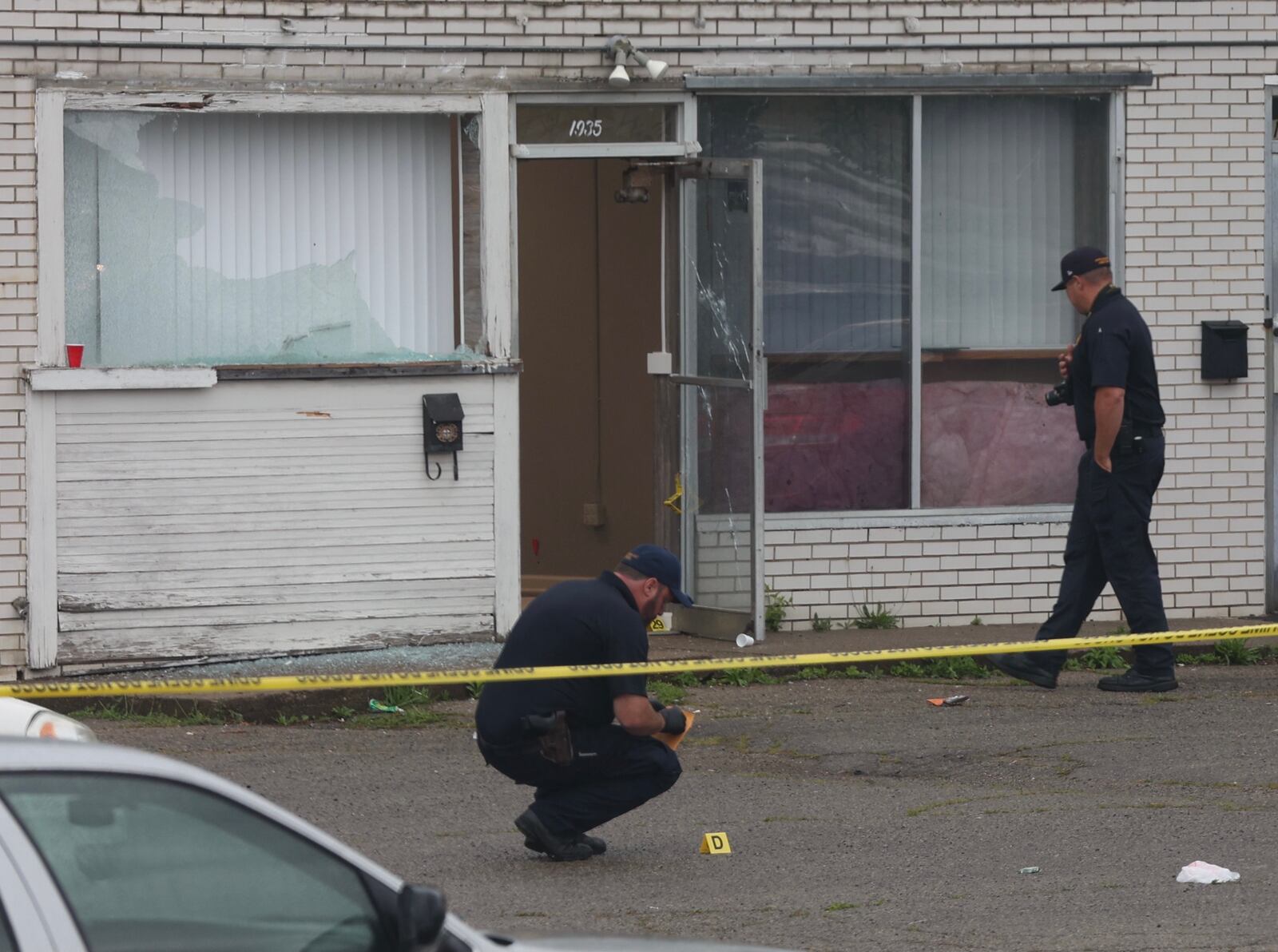 Police investigate a mass shooting in Springfield Wednesday, June 2, 2021, after multiple people were shot on South Yellow Springs Street. BILL LACKEY/STAFF