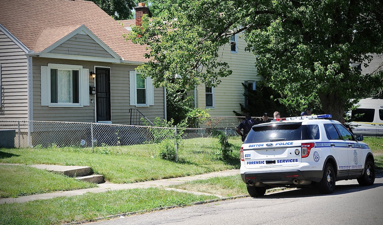 The bodies of a woman and girl were found Thursday, June 23, 2022, inside a house in the 300 block of Burleigh Avenue in Dayton. MARSHALL GORBY/STAFF