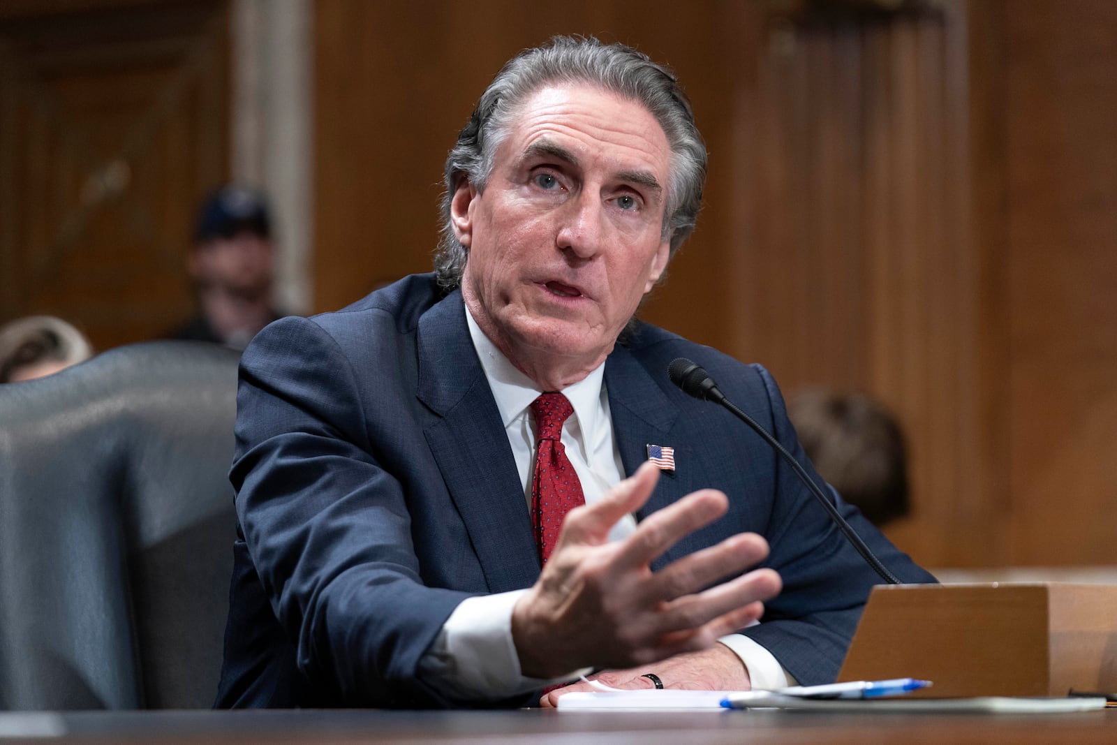 Former Gov. Doug Burgum, President-elect Donald Trump's choice to lead the the Interior Department as Secretary of the Interior, testifies before the Senate Energy and Natural Resources Committee on Capitol Hill in Washington, Thursday, Jan. 16, 2025. (AP Photo/Jose Luis Magana)