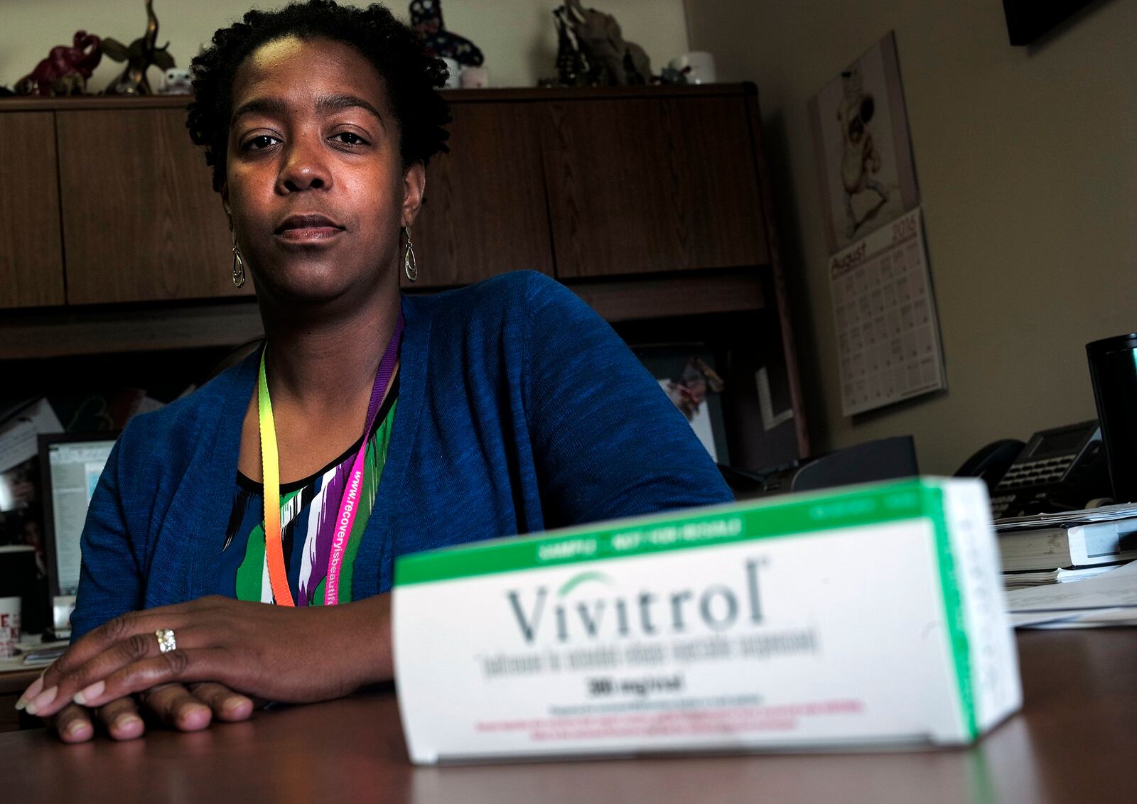 Wendy Doolittle, executive director of McKinley Hall, with a box of Vivitrol. Bill Lackey/Staff